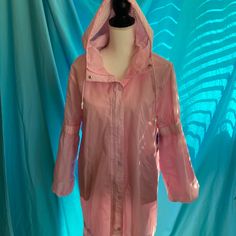 This Is A Light Pink Lightweight Rain Jacket. It Has A Cool Mesh Lining, Long Puffy Sleeves& A Hood. It Also Has Pockets & A Front Zipper!! Casual Hooded Spring Raincoat, Spring Nylon Long Sleeve Outerwear, Oversized Hooded Windbreaker For Spring, Spring Long Sleeve Windbreaker For Rainy Weather, Hooded Spring Rain Outerwear, Spring Nylon Windbreaker For Rainy Weather, Pink Hooded Raincoat For Fall, Spring Long Sleeve Raincoat With Pockets, Spring Trendy Raincoat With Pockets