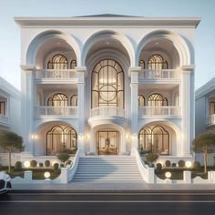 a large white building with many windows and balconies