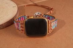 "Materials: Agate, Crystal, Genuine Leather Metals: Alloy Bracelet Length: 6.5\" including dial (Adjustable length, suitable for 6.5-8 inch hands.) This smartwatch band is compatible with 38mm - 44mm Apple Watch face. 32mmStainless Steel magnetic slider 22.8mm slider *This smartwatch band is compatible with 38mm - 44mm Apple Watch face. 32mm magnetic slider. Vegan friendly. This band is fully adjustable to your wrist size. Please kindly notice: Due to the influence of the display and light, it is inevitable that the real object and the picture are a little different." Bohemian Bracelet Strap Watch Accessories As Gift, Bohemian Watch Accessories With Bracelet Strap As Gift, Bohemian Adjustable Apple Watch Band Gift, Handmade Multicolor Watch Accessories For Gift, Handmade Adjustable Bohemian Watch Bands, Bohemian Beaded Watch Bands As Gift, Handmade Bohemian Adjustable Watch Bands, Bohemian Multicolor Watch Bands As Gift, Handmade Bohemian Apple Watch Band