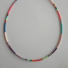 These Seed Bead Color Necklaces are made of glass seed beads of different colors. Also includes Choker Necklaces, approx 1 inch extension chain. I used every Western Necklace, 24k gold plated necklace extension chain, 24k gold Plated lobster claw, Stainless Steel Jewelry Wire. These Seed Bead Charms are perfect to use with your other necklaces. Click on the link to see other Multicolored Necklaces, Beaded Chokers. https://www.etsy.com/shop/dkSeedbead?ref=seller-platform-mcnav Multicolor Letter Beads Jewelry, Multicolor Letter Beaded Jewelry, Rainbow Necklaces With Spacer Beads For Jewelry Making, Colorful Beaded Necklaces With Letter Beads For Jewelry Making, Multicolor Round Spacer Beads Jewelry, Multicolor Letter Beads For Jewelry Making, Colorful Letter Beads For Jewelry Making, Rainbow Beaded Necklaces For Jewelry Making, Rainbow Spacer Beads For Jewelry Making