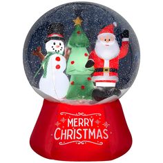 a christmas snow globe with santa, snowman and tree in it