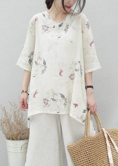 Modern beige print linen tunics for women v neck half sleeve baggy summer blouse

Materials used:linen blended

Measurement:One size fits all for this item. Please make sure your size doesn't exceed this size: XXL/BUST-110cm   
   
length front 73cm / 28.47"
length back 79cm / 30.81"
bust 110cm / 42.9"
Shoulder 42cm / 16.38"
Sleeve length 34cm / 13.26"
Armhole 32cm / 12.48"



We ship worldwide.

Tracking numbers provided for all orders. White Half-sleeve Summer Blouse, White Half Sleeve Summer Blouse, Beige Half Sleeve Blouse For Summer, Summer Beige Half-sleeve Tops, Summer Beige Half Sleeve Tops, Printed Relaxed Fit Half Sleeve Blouse, Printed Half Sleeve Summer Blouse, Summer Printed Half Sleeve Blouse, Oversized White Floral Print Blouse