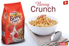 a bag of berry crunch next to a bowl of cereal