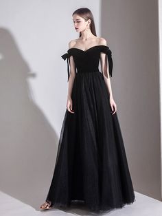 Formal Strapless Tulle Evening Dress, Formal Strapless Evening Dress With Tulle Skirt, Strapless Tulle Evening Dress For Formal Occasion, Strapless Tulle Skirt Evening Dress For Formal Events, Off-shoulder Tulle Gown For Evening, Black Tulle Evening Dress For Prom, Formal Black Tulle Ball Gown, Black Tulle Ball Gown For Formal Occasions, Black Tulle Ball Gown For Formal Events