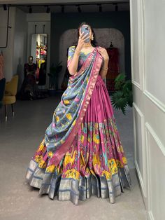 We Make Wedding Lehengas, Indian Lehenga, Bridal Lehenga, Designer Lehenga, South Indian Dresses, Lengha Choli, Chaniya Choli, Lancha, Semistitched Lehenga, Bridesmaid Lehengas, Sabyasachis Lehengas, Floral Skirts, Punjabi Lehengas, Ethnic Lehengas, Indo-western Outfits, Indian Outfits, Bollywood lehengas.  Fabric Details :-   🌷Lehenga Choli🌷 Subtle shades, bold heritage: Kalamkari Dola silk charm 🪸   Lehenga(Stitched) Lehenga Fabric : Dola Silk Lehenga Work : Kalamkari Print With Zari Weaving Border  Waist : SUPPORTED UP TO 42 Lehenga Stitching : Stitch With Canvas  Lehenga Closer : Drawstring With Zip Length : 41 Flair : 3.80 Meter  Inner : Micro Cotton Blouse(Unstitched) Blouse fabric : Dola Silk  Blouse Work : Printed With Zari Weaving Border  Blouse Length : 0.90 Meter Dupatta Dupa Kalamkari Half Saree Lehenga, Trendy Half Saree Designs, Silk Blouse Work, Tassels Dupatta, Lehenga Stitching, Lehenga Stitched, Heavy Lehenga, Kalamkari Dresses, Gown Designs