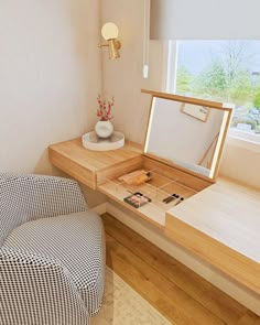 an open box sitting on top of a wooden desk next to a chair and window