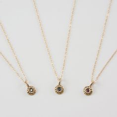 Keep it simple with the DELIA Tiny Flower Pendant Necklace. Small but with a lot of style, accentuate your look with its distinguished elegance. It grabs the attention not just by its shape but also by its charming 14K gold color. This necklace gives you all the reasons to make it a pick of the day. Features: Comfortable Lightweight Elegant and minimal High quality Hand-carved flower-shaped pendant Size & Material: Length: 17" inches Material: 14K gold chain and pendant with an inset of a diamon Minimalist Birthstone Necklace With Flower Pendant, Minimalist Flower Pendant Birthstone Necklace, Minimalist Birthstone Flower Pendant Necklace, Elegant Yellow Gold Round Flower Necklace, Elegant Round Yellow Gold Flower Necklace, Elegant Flower Charm Necklace With Round Pendant, Elegant Gold Plated Flower Charm Necklace, Elegant Gold Plated Necklace With Flower Charm, Gold Dainty Flower Pendant Birthstone Necklace