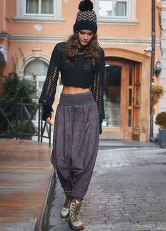 Embrace the charm of gypsystyle clothing with these Burgundy Aladdin  Harem Pants, a perfect blend of comfort and fashion. Featuring an  elastic waistband, these loose clothes for women are ideal for relaxed  wear or as a statement piece for any autumn festival. The claret red  color adds a warm, vibrant touch to your wardrobe, making it a standout  option for bohemian hippy gifts or even a 90s pants present.