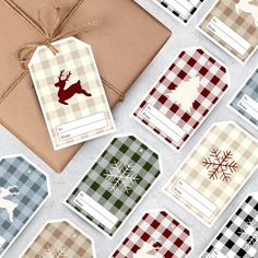 christmas gift tags with reindeer and snowflakes on them