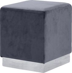 a square ottoman that is grey and silver