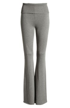 A ribbed fold-over waistband brings cozy energy to these cotton-blend leggings with flared hems. 33 1/2" inseam; 26" leg opening; 10 1/2" front rise; 12" back rise (size Medium) Pull-on style 48% cotton, 31% polyester, 15% polyamide, 6% viscose Machine wash, tumble dry Imported Casual Cotton Bottoms With Flared Hem, Casual Flare Yoga Pants For Loungewear, Casual Stretch Bottoms With Flared Hem, Flare Bottoms For Fall Loungewear, Casual Ribbed Leggings For Fall, Spring Flare Yoga Pants For Loungewear, Ribbed Flare Pants For Loungewear, Fall Loungewear Flare Yoga Pants, Flare Ribbed Pants For Loungewear