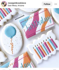 cookies decorated with colorful icing on top of each other and the words happy birthday