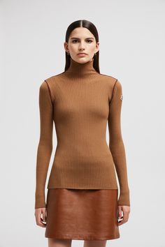 Featuring a sleek design, this turtleneck sweater is featured in a slim, figure-hugging fit. The lightweight knit is crafted from a luxurious wool, cashmere and viscose blend. Brown Cashmere Turtleneck Top, Fitted Merino Wool Turtleneck For Layering, High Neck Cashmere Turtleneck, Brown Turtleneck For Workwear, Fitted Merino Wool High Neck Turtleneck, Fitted Wool Turtleneck For Work, Fitted Merino Wool Turtleneck, Fitted Wool Top With Funnel Neck, Elegant Ribbed Wool Turtleneck