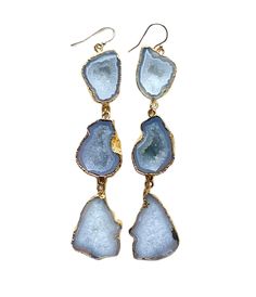 These stunning gray agate geode earrings are sure to add style and effortless sophistication to your wardrobe. The natural stones feature a unique design, sure to make a statement. Perfect for everyday wear or a special occasion, these earrings will be a beautiful addition to your collection. 4" Long 14k Gold-filled Earring Hooks Heaviness: 2.5/10 Geode Jewelry, Gray Earrings, Geode Earrings, Grey Agate, Light Earrings, Agate Earrings, Stone Feature, Agate Geode, Gold Filled Earrings