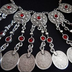 This fiery, festive necklace is a favorite of those who like to make a statement! Silver-plated, etched medallions accented with bright red stones dangle beautifully in the piece that's full of boho-chic style and movement. Festive Dangle Jewelry, Five In A Row, Festival Necklace, Red Stones, Pretty Jewelry, Metal Work, Red Stone, Pretty Jewellery, Boho Chic Fashion