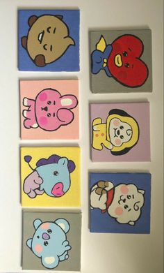 four squares with cartoon animals painted on them