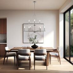 a dining room table with chairs and a chandelier