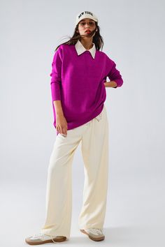 The Oversized Crew Neck Long Sleeve Sweater in Fuchsia is a vibrant addition to your wardrobe, perfect for adding a pop of color to any outfit. Crafted from a cozy blend of 40% viscose, 32% nylon, and 28% polyester, this fine-knit sweater offers both comfort and style.  With its relaxed, oversized fit, the sweater drapes effortlessly, making it ideal for layering or wearing on its own. The classic crew neckline and long sleeves contribute to its timeless appeal, while the bold fuchsia hue brings a lively touch to your look. This versatile piece can be easily paired with neutral tones, allowing you to create a variety of stylish ensembles, from casual to boho-inspired outfits.  The model, who is wearing a size U, measures 33 inches at the bust, 25 inches at the waist, and 35 inches at the h Basic Sweater, Fine Knit Sweater, Boho Fabric, Basic Sweaters, Fuchsia Color, Estilo Boho, Style Boho, Neutral Color, Fit Style