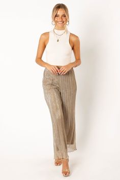 DETAILS
The pant of the season has arrived! This glamorous high waisted silver pant features an elasticised waistband for ultimate comfort and style. With functional side pockets, you won't have to sacrifice function for fashion as you take on the party season.

high waisted style pant
elasticised waistband
functional side pockets
plisse material

lurex silver thread detail
relaxed fit
partially lined

material - 100% polyester









SIZING

model is 5' 8" and wears a Size 2

model stats: bus Plisse Pants, Silver Pants, Style Pant, Pants Details, Silver Fabric, High Waist Fashion, Fall Favorites, New Day, Houston