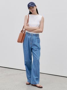 Editor's Notes The denim pants have a wide fit and a relaxed silhouette. - Two tones of blue to match various items- Thickness and density that fits the summer- Comfortable and loose fitMeasurements(in.)32 / 34 / 36- Waist: 12.99 in. / 13.78 . in. / 14.76 in. - Hips: 18.9 in. / 19.69 in. / 20.67 in. - Front Rise: 12.4 in. / 12.8 in. / 13.19 in. - Bottom Rise: 16.34 in. / 16.73 in. / 17.13 in. - Bottom Hem: 10.43 in. / 10.63 in. / 11.02 in. - Total Length: 40.55 in. / 40.94 in. / 41.54 Wide Denim Pants, White Wide Leg Jeans, Pocket Bag, Denim Trousers, Trouser Jeans, Wide Leg Jeans, Denim Pants, Jeans Pants, Density