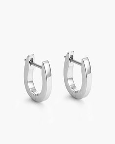 Achieve understated style with our Huggie Earrings in silver. Their simple yet stylish design makes them perfect for everyday wear, and the 925 sterling silver post ensures durability and comfort, allowing you to wear them with confidence. Huggie Earrings Silver, Understated Style, Solid Gold Chains, Silver Shop, Huggie Earrings, Simple Earrings, Men's Rings, Pendant Bracelet, Silver Man