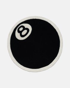 a black and white ball with the number eight on it