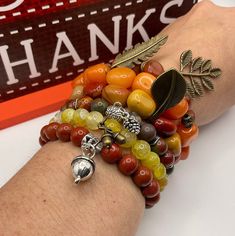 "These Fall/Autumn theme Stretchy bracelets are handcrafted personally for me, Derlis. You can buy these bracelets as a set of 6 different stretch bracelets or buy them individually. Also, you can pick your size bracelet. A wonderful gift to your friends, family or love ones, or to wear at Thanksgiving dinner, family reunion. It is very important that you measure your wrist before placing your order to find your correct size bracelet. You can use a flexible tape measure, or a piece of paper, or Dinner Family, Autumn Jewelry, Autumn Bracelet, Picasso Jasper, Craft Corner, Fire Agate, Fall Clothes, Square Bead, Fall Jewelry