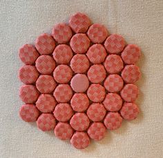 pink and white cookies arranged in the shape of a flower