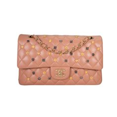 Add a touch of elegance to your outfit with this beautiful Chanel bag. Made of high-quality lambskin leather, this bag features a quilted finish and a double flap design. The bag is medium-sized, with a width of 10 inches, a height of 7 inches, and a depth of 3 inches. The strap is adjustable and can be worn as a crossbody, with a drop of 17 inches. The bag comes with a brand card and features a variety of accents, including charms and beaded details. The hardware is gold-plated, complementing the overall gold tone of the bag. The bag is perfect for a wedding, party, or casual outing. With its classic design and vintage feel, this Chanel bag is a must-have for any fashion-forward woman. Luxury Quilted Flap Bag, Quilted Leather Double Flap Bag, Luxury Quilted Double Flap Bag, Chanel Mini Bag, Vintage Chanel Bag, Mini Pink, Chanel Mini, Paloma Picasso, Chanel Logo