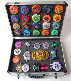 an open case filled with lots of different types of watches