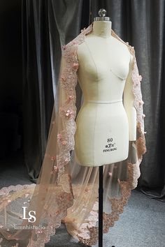 a mannequin with a veil on top of it