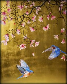 two birds are flying near pink flowers on a gold background