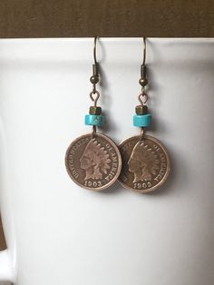 "Vintage Indian Head Penny Earrings, Copper Earrings, White Blue Turquoise Bead, Southwestern Style Jewelry ----------- Coin: Indian Head Penny Country: U.S.A. Date: various available Beautiful Indian Head Pennies are now hanging from these copper and turquoise earrings. Whether you're a coin collector, fan of southwest themed jewelry, or vintage items...you'll loves these unique earrings. These are genuine circulated coins that have some natural markings and patina. You will receive a random da Turquoise Copper Jewelry For Festival, Rustic Turquoise Jewelry For Festivals, Nickel Free Southwestern Dangle Jewelry, Nickel Free Southwestern Drop Earrings, Bohemian Concho Earrings As Gift, Rustic Turquoise Nickel Free Earrings, Rustic Dangle Jewelry For Festivals, Rustic Beaded Dangle Jewelry, Rustic Concho Jewelry Gift