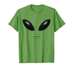 an alien face with black eyes on a green t - shirt