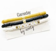 "Support your team with our Gameday Line! Don't see your team colors? Message us as we can make any team set! Bracelet Set includes all 3 bracelets shown. Made to fit a 7-7.5\" wrist comfortably but can be made smaller or larger upon request! Adjustable stretch bracelets ❤️" College Football Gameday, Black And Gold Bracelet, Gold Bracelet Stack, Football Jewelry, Team Bracelets, Gold Bracelets Stacked, Set Bracelet, Beading Crafts, Custom Bracelets