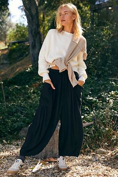 Your newest go-to summer pants from our free-est collection, featured in a billowy, harem-inspired silhouette with dropped side pockets for added dimension. * Elastic waistband * Drawstring detail * Lightweight, effortless design | Quinn Pants by free-est at Free People in Black, Size: M Quinn Pants, Smaller Hips, Trouser Outfit, Cuddl Duds, Boho Pants, Summer Pants, Black Fits, Pants Outfit, Boho Outfits