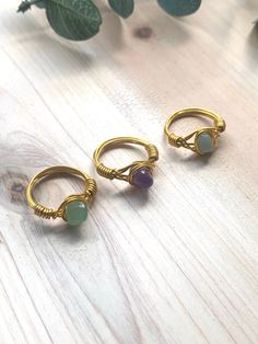 3 Pack Gemstone Rings! 3 Wire Wrapped Gemstone rings made with natural gemstone chips using gold or silver filled aluminum wire (tarnish resistant). Each ring is carefully crafted with its own unique gemstone. *Please be sure to indicate in Personalization: 1. Gold or Silver (Ex. 1 gold, 2 silver or 3 gold, etc. ) 2. Name of three gemstones (see photo listing for reference). <3 Rings Crystal, Healing Jewelry, Unique Gemstones, Natural Crystals, Rings Statement, Wire Wrapped, Crystal Healing, Silver Fashion, Wire Wrapping