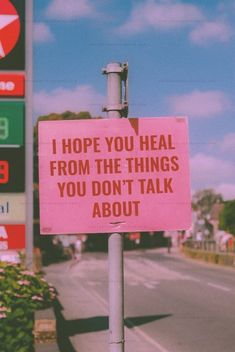 a pink sign that says i hope you heal from the things you don't talk about