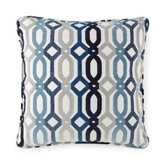 a blue and white pillow with links on it's side, in front of a white background