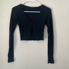 Black Deep V, Fitted, Crop Top, Long Sleeve. Very Sexy. Never Been Worn, Brand New Without Tags. Black Stretch V-neck Crop Top, Black V-neck Top For Night Out, Chic Black V-neck Crop Top, Black Casual V-neck Crop Top, Casual Black V-neck Crop Top, Casual V-neck Crop Top For Night Out, Fitted Crop Top, Crop Long Sleeve, Crop Top Long Sleeve