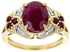 3.64ct oval ruby with .24ctw round Vermelho Garnet™ and .01ctw round white four diamond accent, 18k yellow gold over sterling silver ring. Measures approximately 0.69"L x 0.44"W. Not sizable. White rhodium Wholesale Silver Jewelry, Jewelry Website, Red Gemstones, Pink Gemstones, Bridal Gold Jewellery, Pretty Rings, Red Ruby, Garnet Rings, Garnet Gemstone