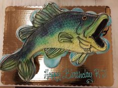 there is a fish that is painted on the side of a plaque with words underneath it