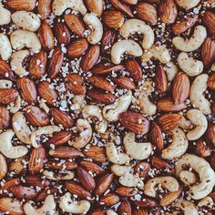 nuts and seeds are mixed together to make a nutritious background or wallpaper