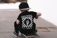 Let your toddler show off their cool style with this Toddlerhood - "It's a Lifestyle" tee! Made from 100% ringspun cotton, this short-sleeved shirt is as comfortable as it is stylish. Show that your kids are part of the Toddlerhood lifestyle! Toddler Shows, Surf Photos, Pajama Romper, Christmas Blankets, Boys Fashion, Bday Ideas, British Indian, Show Off, Mix Match