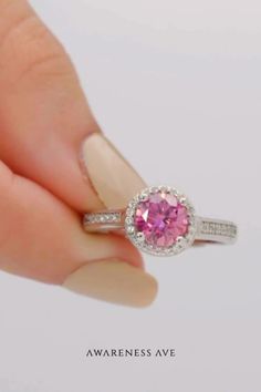 Introducing The Venus: Round-Cut Pink Moissanite Ring in S925 Sterling Silver. Explore our Moissanite Rings Collection for unmatched brilliance. Handcrafted with real moissanite gemstones on premium sterling silver bands. 💖 Pink Moissanite Ring, Silver Bands, Rings Collection, Halo Design, Everyday Luxury, Pink Ring, Moissanite Ring, Moissanite Rings, Sterling Silver Bands