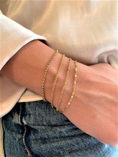 Dainty gold Chain bracelet, Simple Everyday Stacking Bracelet, Tennis Bracelet Girlfriend GiftThese Dainty gold chain bracelets are perfect for stacking with other bracelets or wearing on their own. This jewelry set will make a great gift to your wife, mother, sister or just to treat your self!!!D E T A I L S1. Gold Plated stainless Steel Rolo Chain2. Gold Plated stainless Steel oval Chain3. Gold Plated stainless Steel Satellite Chain4. Gold Plated stainless Steel Lip ChainFrom the drop down bar Kabbalah Bracelet, Dainty Gold Chain, Dainty Gold Bracelet, Black Velvet Choker, Gold Chain Bracelet, Bracelet Tennis, 18k Gold Bracelet, Black Choker Necklace, Bracelet Simple