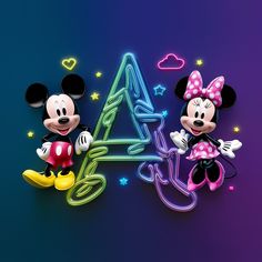 two mickey and minnie mouses are standing next to each other in front of a neon sign