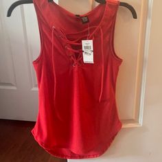 Nwt Macy’s No Comment Bright Red Cross V-Neck Front Tank Top With Ties In Front. Size M. Vibrant Red Color! Very Comfortable Material. Never Worn. Perfect Condition. Smoke Free Home. Bright Red, Red Cross, Vibrant Red, Red Color, V Neck, Womens Tops, Tank Tops, Red, Women Shopping