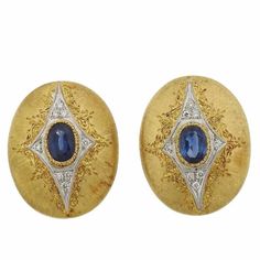 A pair of 18k yellow gold earrings set with sapphires and approximately 0.10ctw of H/VS diamonds. DESIGNER: Mario Buccellati MATERIAL: Gold GEMSTONE: Sapphire, Diamond DIMENSIONS: 25mm x 20mm WEIGHT: 15.9 grams MARKED/TESTED: Mario Buccellati, 750, Italy CONDITION: Estate Buccellati Jewelry, Sapphire Diamond Earrings, Round Cut Diamond Earrings, Buy Gold Jewelry, Sapphire And Diamond Earrings, Diamond Earrings Studs Round, Kay Jewelry, Fine Gold Jewelry, Lapis Lazuli Jewelry