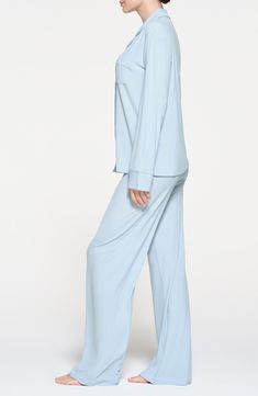 These essential PJs in ribbed stretch modal from Kim Kardashian's SKIMS line bring relaxed comfort to your nighttime routine. 26" Regular top length; 30" inseam; 22" leg opening; 11 1/2" front rise; 16" back rise (size Medium) Top has notched collar; long sleeves; chest patch pocket 91% modal, 9% spandex Machine wash, dry flat Imported Skims Pajamas, Nighttime Routine, Hairstyling Products, Fragrance Cologne, Night Time Routine, Rollerball Perfume, Makeup Gift, Beauty Sale, Sleep Set